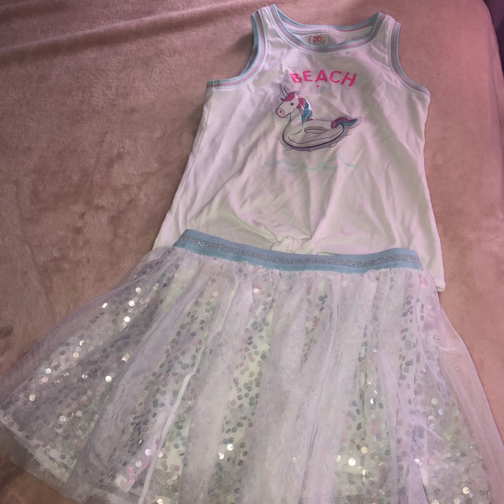 Unicorn float shirt and sequins skirt